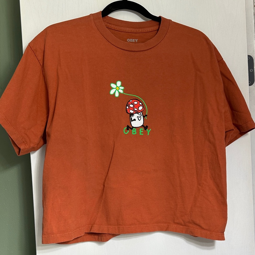 Obey Rust Graphic Tee with Mushroom Design. Cropped tee.
